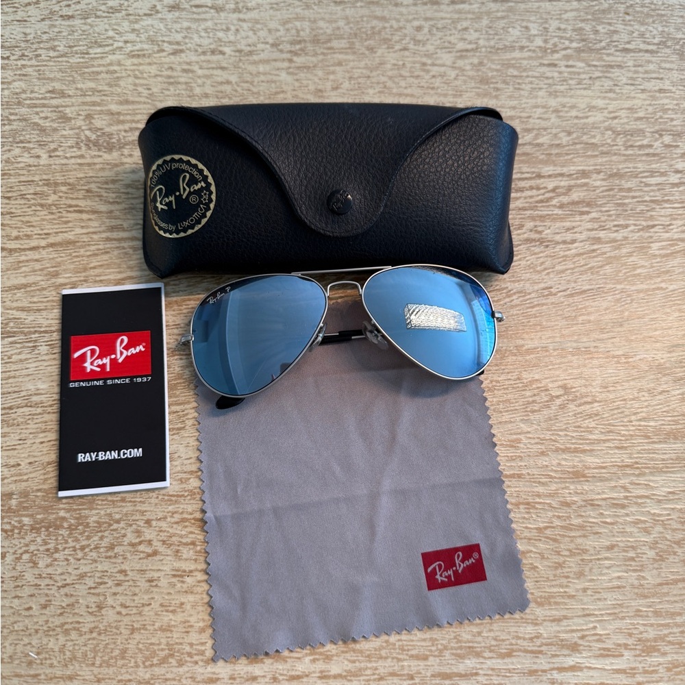 Ray-Ban Aviator Sunglasses with Silver Frame and Mirrored Blue Lenses. .